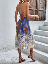 Robe imprimée à col licou et liens croisés